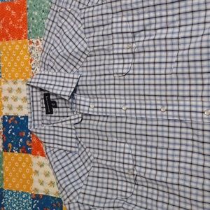 Panhandle slim M, 15 1/2, 34  65% polyester and 35% cotton.